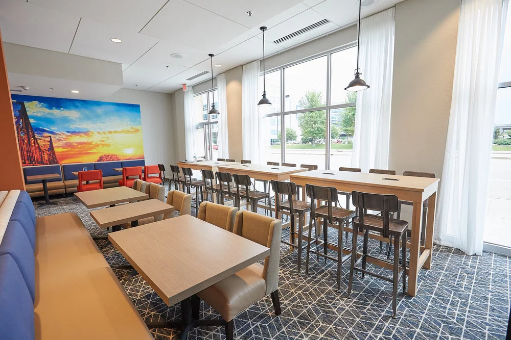 Gundersen Hotel and Suites - Breakfast Seating Area in Hotel Lobby.